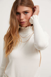 Jersey brillos con ribete crudo