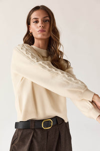 Camisola de ochos creme com manga abalonada