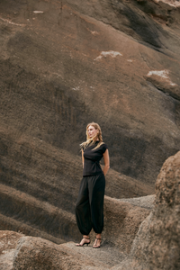 Calças bombachas pretas com plumeti