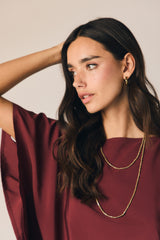 Blusa efeito lenço rosa com corte amplo