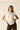 Blusa sin mangas blanca con volantes