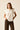 Blusa sin mangas blanca con volantes