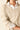 Jersey cuello pico beige