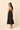 Vestido midi cuello pico volantes negro