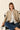 Chaqueta bolsillos flecos beige