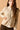 Chaqueta austriaca de punto beige