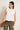 Top lino sin mangas cuello volante blanco