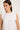 Top lino sin mangas cuello volante blanco