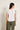 Top lino sin mangas cuello volante blanco