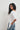 Camiseta asimétrica tachas blanca