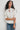 Camisa fruncida cuello volante natural