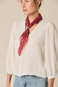 Blusa fina cuello pico blanco