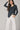 Jersey asimétrico cuello drapeado gris antracita