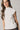 Top cuello alto frunce lateral natural