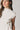 Top cuello alto frunce lateral natural