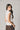 Top cuello alto frunce lateral natural