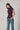 Top cuello alto frunce lateral berenjena