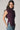 Top cuello alto frunce lateral berenjena