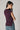 Top cuello alto frunce lateral berenjena