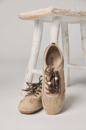 Deportiva detalle lateral topo