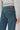 Jeans botón desplazado azul tejano