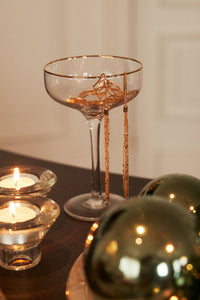 Collar largo dorado con flecos