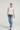 Top fluido con detalle de piedras blanco
