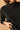 Jersey bicolor negro y beige
