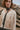 Chaqueta flecos beige