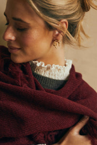 Pendientes dorados lazo