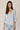 Top cuello pico puntilla celeste