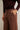 Pantalón cuadros tachas berenjena