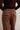 Pantalón cuadros tachas berenjena