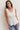 Top volante cuello pico blanco
