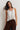 Top nudo hombro blanco