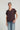 Blusa tachas flecos berenjena