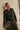 Chaqueta efecto piel botones negro