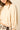 Blusa manga abullonada lazo trasero beige