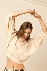 Blusa manga abullonada lazo trasero beige