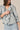 Blusa volante vichy azul tejano