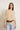 Capa punto brillo beige