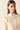 Chaqueta punto flecos beige