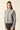 Chaqueta punto flecos gris