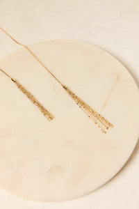 Collar largo dorado con flecos