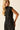 Top punto negro con detalle fruncido