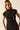 Top punto negro con detalle fruncido