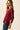 Jersey cuello pico nervio burdeos