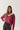 Jersey rústico cuello pico rosa