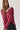 Jersey rústico cuello pico rosa
