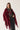 Poncho punto flecos vino
